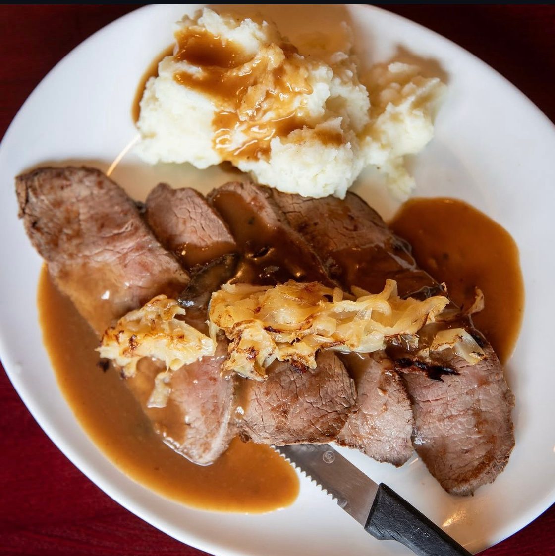 Open Sliced Steak.